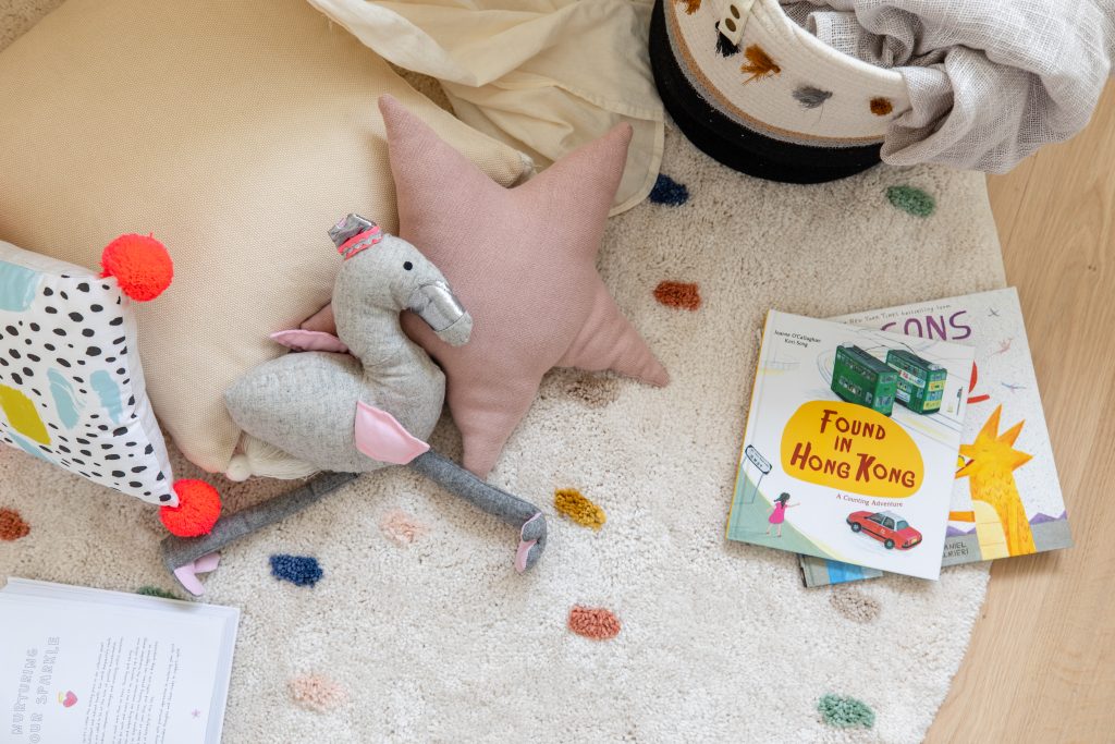 nursery area stuff toy with books